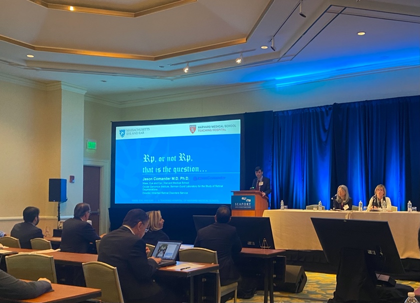 A group of people in a conference room Description automatically generated with medium confidence