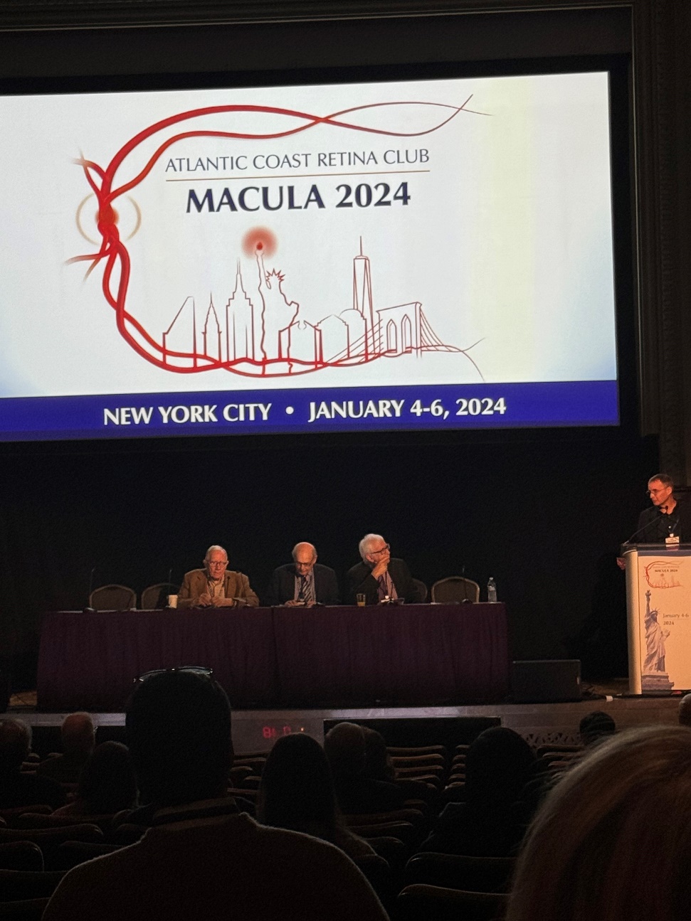 A group of people on a stage Description automatically generated