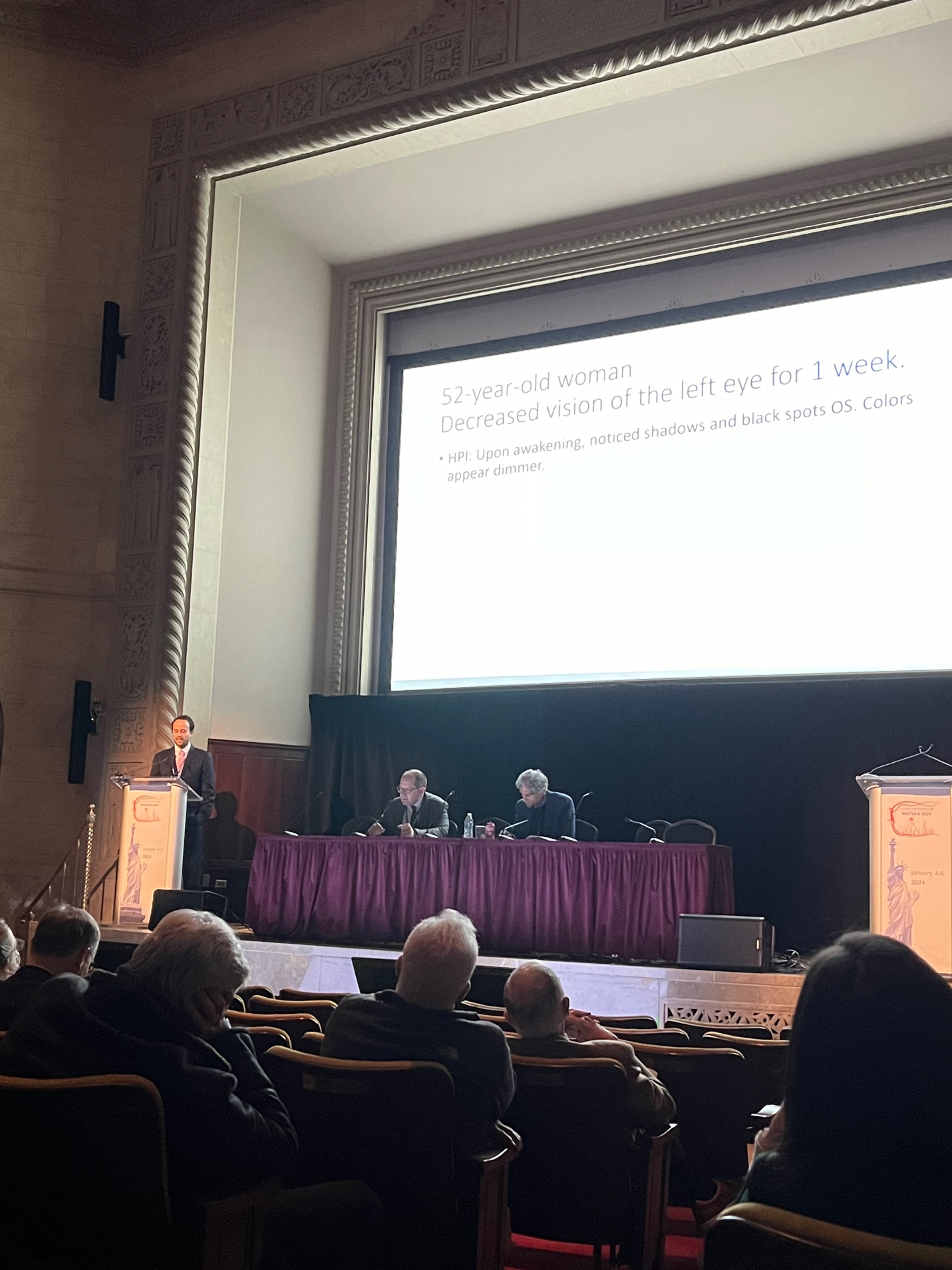 A group of people on a stage Description automatically generated