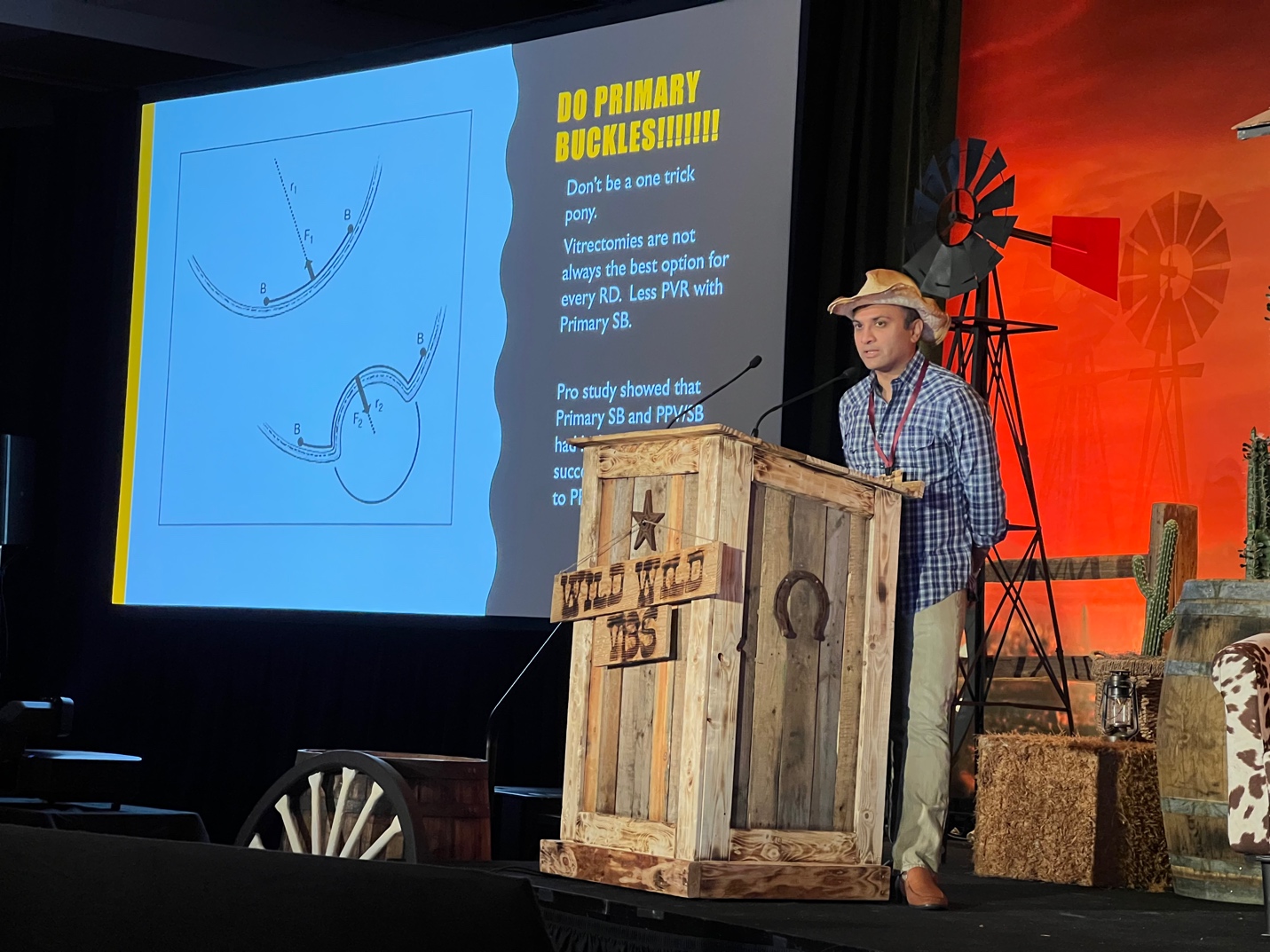 A person standing at a podium Description automatically generated