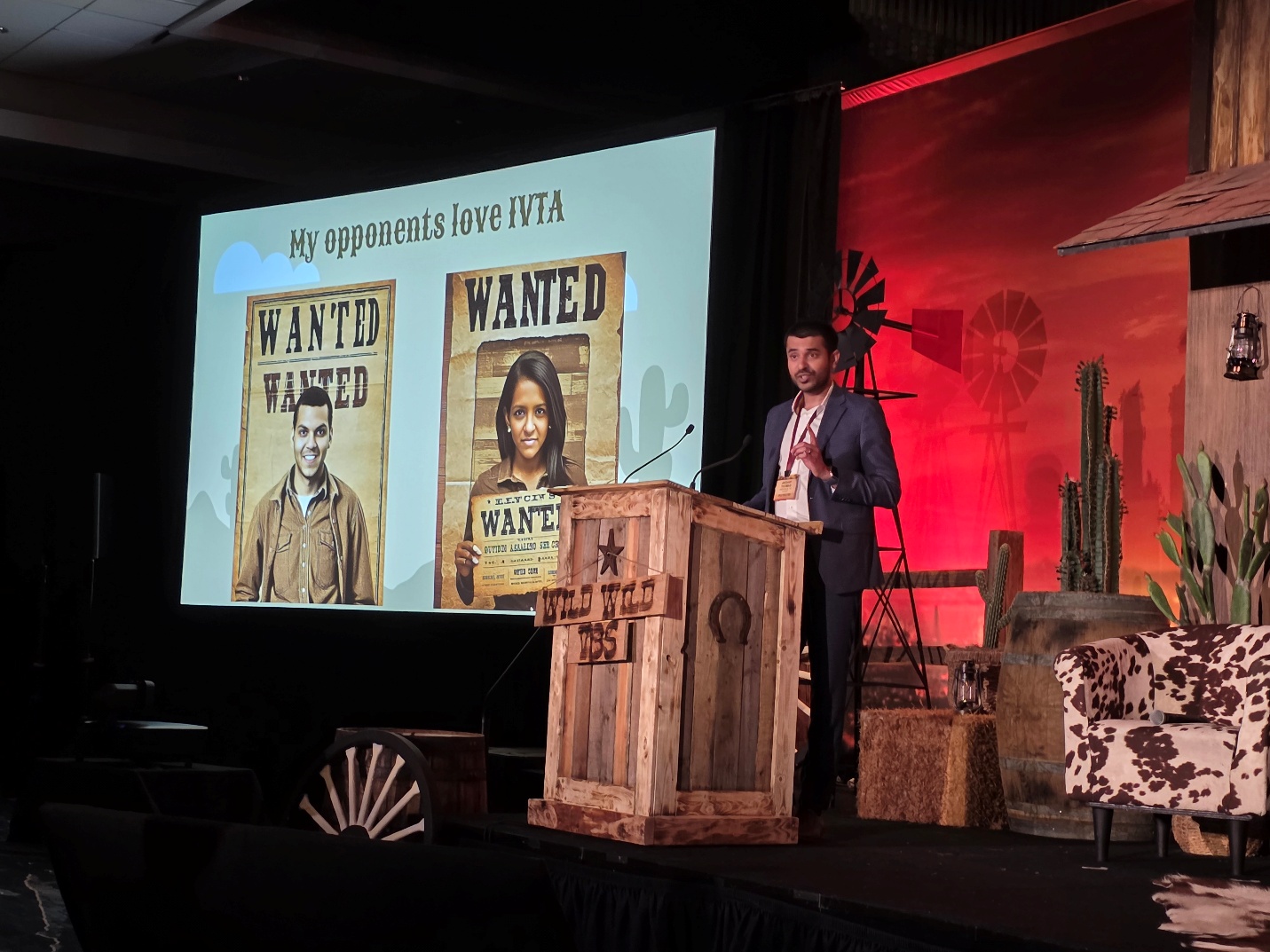 A person standing on a stage AI-generated content may be incorrect.